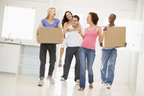 House movers loading furniture in North Finchley