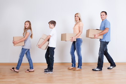 North Finchley home move preparation with labelled boxes and furniture