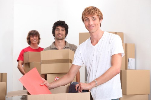 Local office movers handling furniture in North Finchley